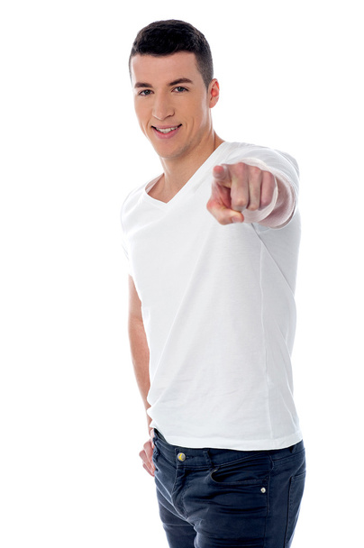 Young smiling guy pointing you out - Foto, imagen