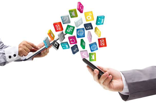 ruce držící telefon a tablet pc s barevnými aplikací ikony - Fotografie, Obrázek