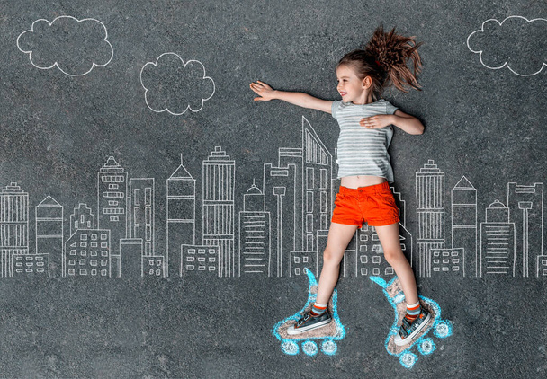 Girl in roller skates painted with chalk - Photo, Image