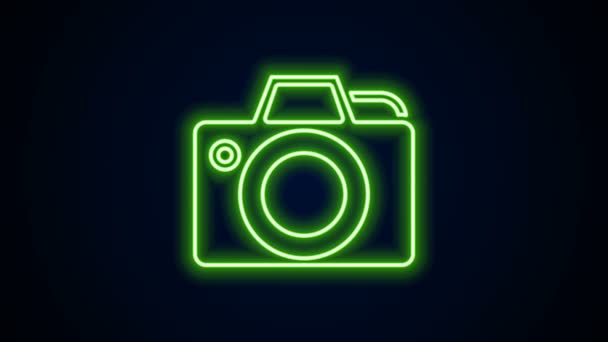 Linea neon incandescente icona della fotocamera fotografica isolata su sfondo nero. Icona della fotocamera fotografica. Animazione grafica 4K Video motion - Filmati, video