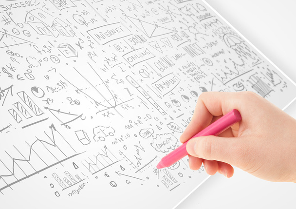 Menselijke hand schetsen ideeën op een Witboek - Foto, afbeelding
