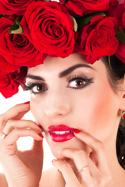 Beauty fashion model with red roses hairstyle - Photo, Image