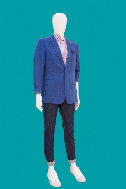 Full length male mannequin dressed in fashionable clothes, isolated on a green background. No brand names or copyright objects. - Valokuva, kuva