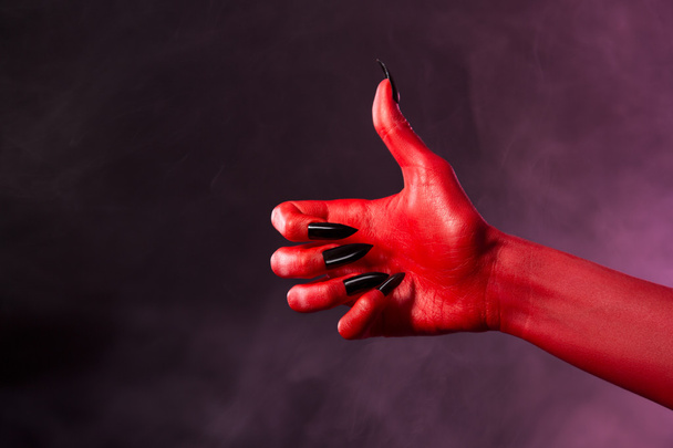 Red devil hand showing thumbs up  - Fotoğraf, Görsel
