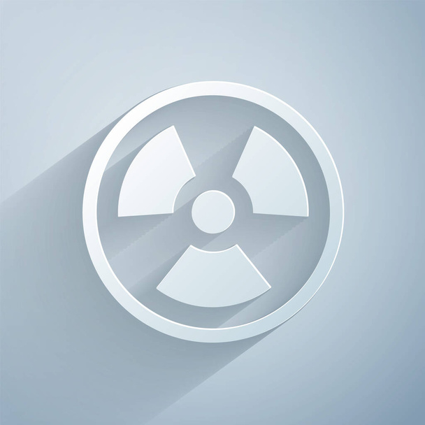 Paper cut Radioactive icon isolated on grey background. Radioactive toxic symbol. Radiation Hazard sign. Paper art style. Vector. - Διάνυσμα, εικόνα