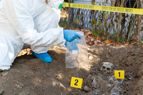 War crime investigation. Forensic science specialist at work. - Foto, immagini