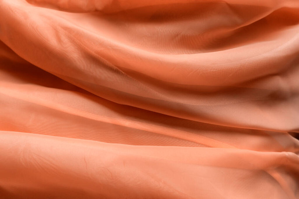 Růžový tyl. Textilie se stočily do klubíčka a vytvořily abstraktní vzor. Velmi pěkné pastelové barvy. Použít texturu jako pozadí - Fotografie, Obrázek