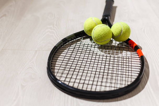 A set of tennis. Racket and ball. Studio shot - 写真・画像