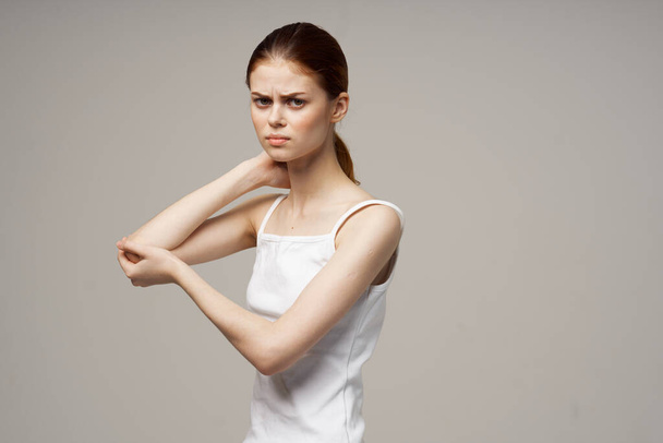 woman holding elbow pain osteoporosis health problems - Fotografie, Obrázek