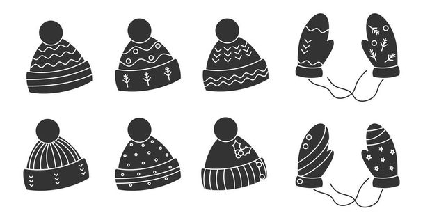 Glyph knitted hat mitten headwear xmas vector set - ベクター画像