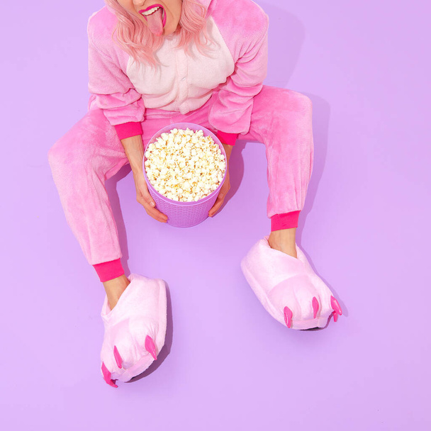 Pajamas Party Girl concept. Stay Home. Relax.  Popcorn lover. Minimal. Home Cinema style - Fotoğraf, Görsel