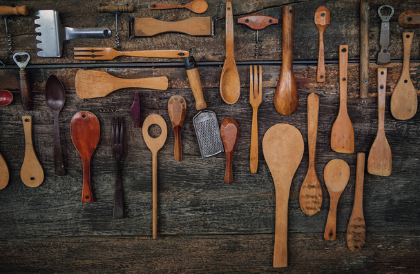 Wooden Kitchen Utensils decorated on old wood background - Фото, изображение