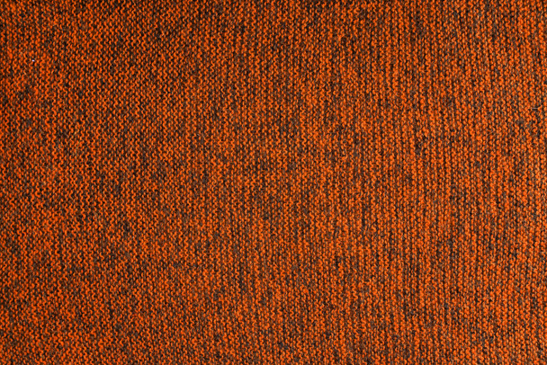 oranssi ja musta melange neulosta rakenne ja tasainen tausta - Valokuva, kuva