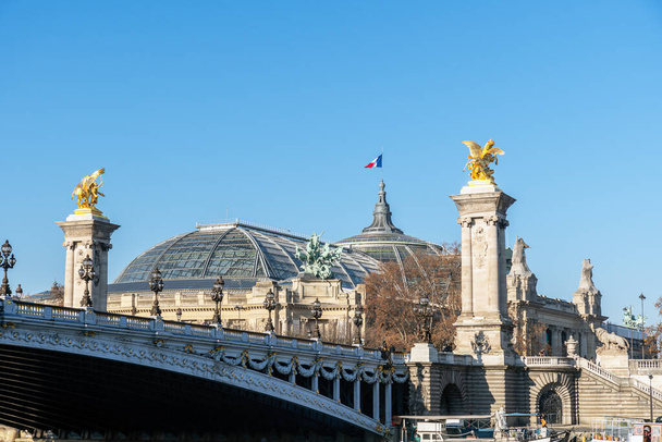 Alexandre III bridge and Grand Palais on a sunny day in Paris - France - Photo, image