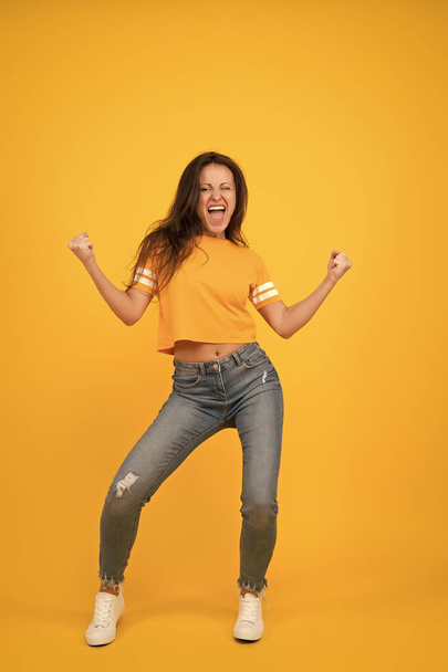 Scream of happiness. Happy winner yellow background. Pretty girl feel happiness. Sexy woman enjoy happiness. Victory and success. Being positive. Having fun. Choosing happiness - Foto, imagen
