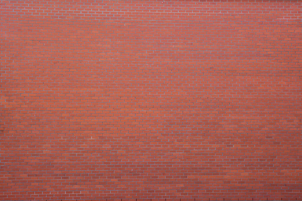 Czerwony brązowy blok cegły ściany Pięknie ułożone tło tekstury. - Zdjęcie, obraz