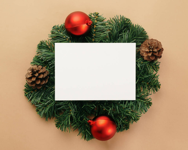 Merry christmas greeting card mockup template with pine leaves decorations. - Photo, Image