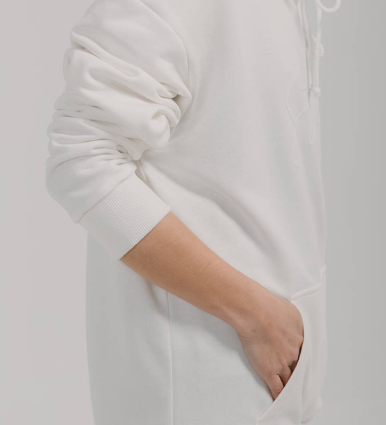 pocket sweatshirt long sleeves female hands close up elastic bands - Foto, Imagem