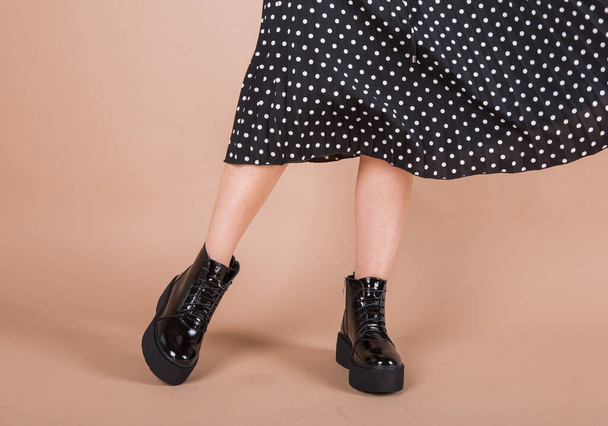 woman shoes winter studio fashion modern on model legs - Foto, Imagen