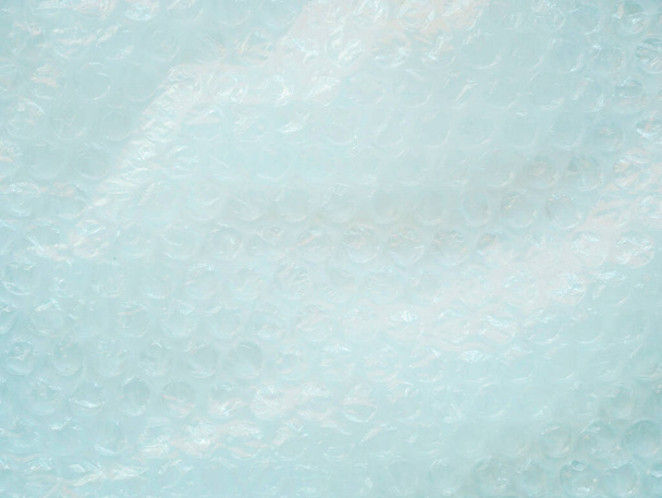 Feche a bolha de ar mercadoria de proteção warp. urdidura de plástico Embalagem industrial - Foto, Imagem