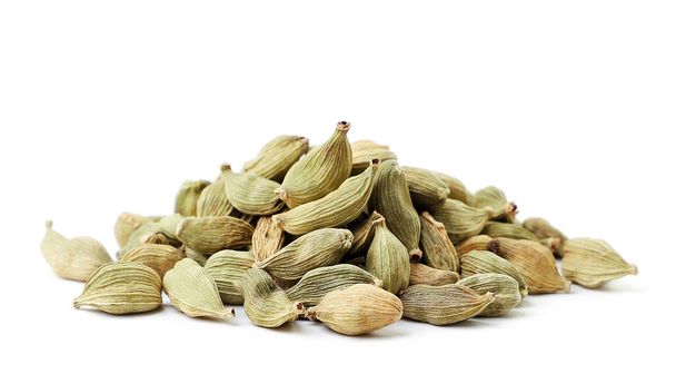 Heap of whole cardamom pods on a white background. Isolated - Photo, Image