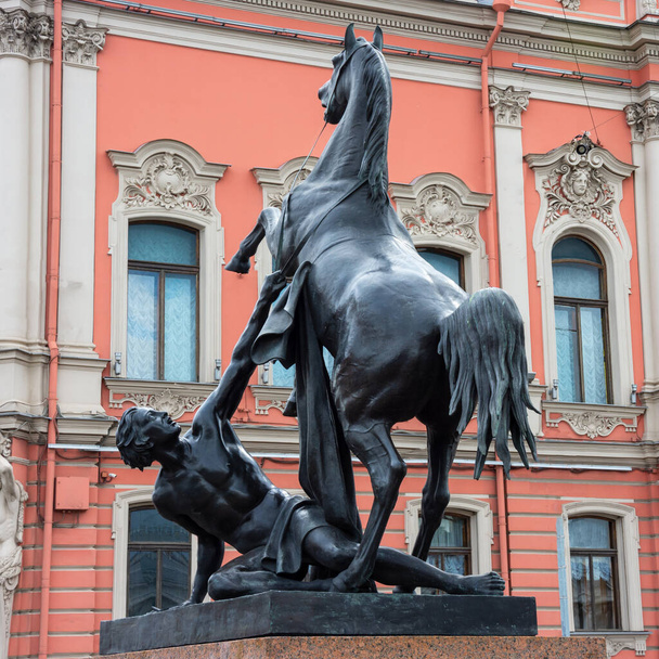 Equestrian sculptures on the Anichkov bridge over the Neva river in St. Petersburg, Russia - Photo, Image