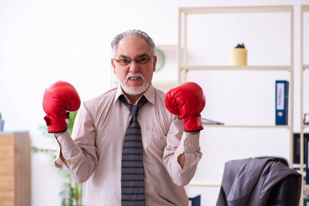 Businessman angry and furious at the workplace - Photo, Image