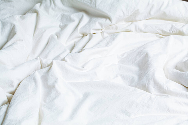 White blanket bed background. Home comfort concept. - Foto, imagen