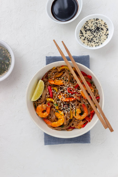 Noodles with shrimps, pepper and soy sauce. Asian food. Wok - Фото, изображение