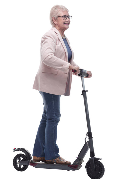 side view. modern elderly woman with electric scooter - Foto, Imagen