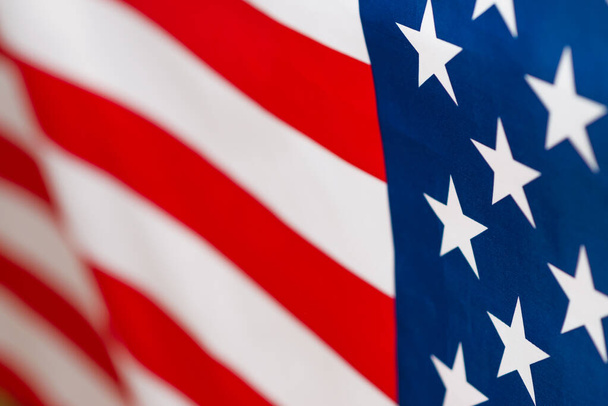 American flag as a background. Blurred background.  - Φωτογραφία, εικόνα