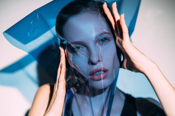 fashion art portrait female model face blue filter - Фото, зображення