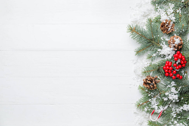 Beautiful Christmas composition on white wooden background - Foto, Imagen