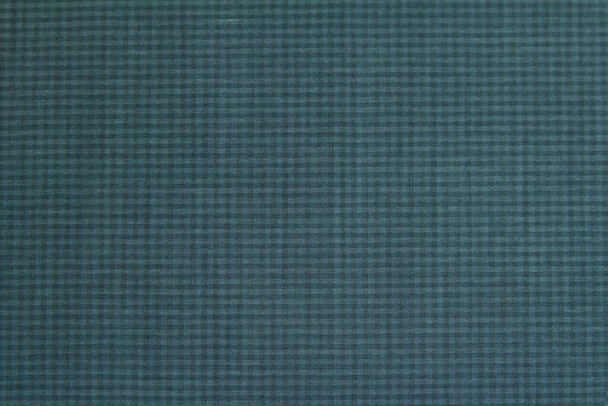 Background made of wool fabric in a small check of green-gray color for the autumn-winter wardrobe. Horizontal orientation - Fotoğraf, Görsel