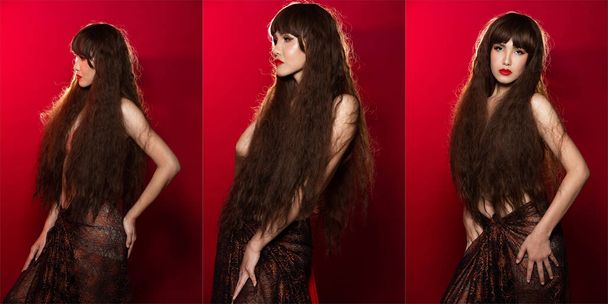 Bella asiatica LGBT donna con lunghi capelli ricci esprimere forte sensazione attraverso i suoi occhi, lei anche nudo o in topless su sfondo rosso - Foto, immagini