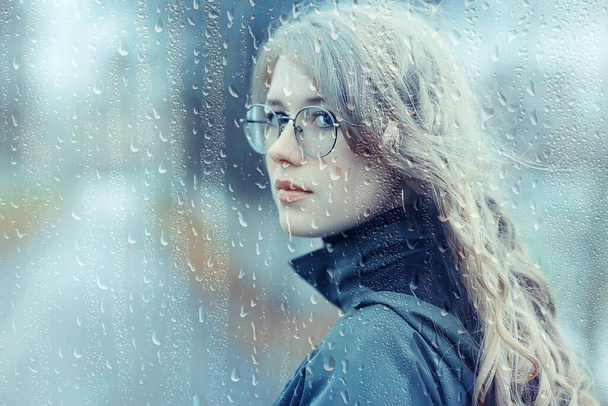 seasonal autumn portrait, sad girl with umbrella, november seasonal virus immunity on a walk - Valokuva, kuva