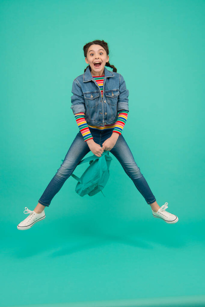 Make the first day memorable. Happy child jump blue background. September 1. Back to school. Startup. September 1. Non-formal education. Knowledge day. New beginning - Фото, изображение