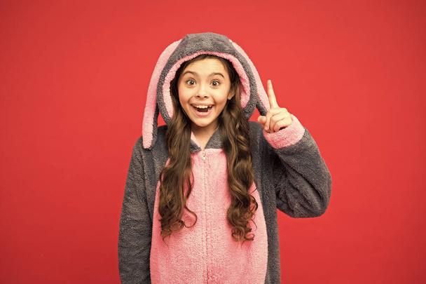 inspired rabbit child relax. Baby animal. create your morning. comfortable homewear fashion. small girl wear easter bunny costume. happy kid in kigurumi pajama. pajama for your cozy sleep - Foto, imagen