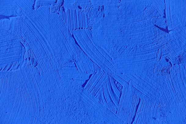 Painting close up of vivid blue color, paint brush strokes texture for interesting, creative, imaginative backgrounds. For web and design. - Photo, Image