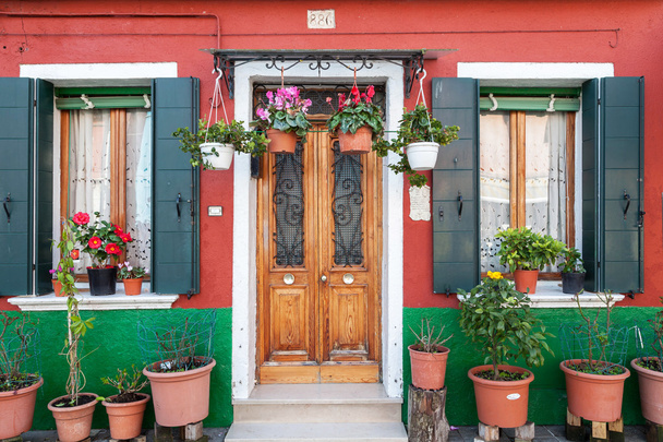 Painted colorful house in Burano, Venice - 写真・画像
