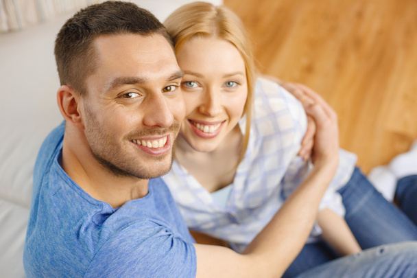 Smiling happy couple at home - Photo, image