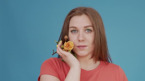 fragile girl with beautiful yellow rose in her hand - Footage, Video