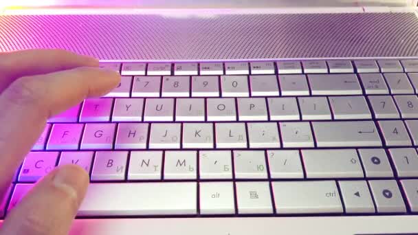 First-person view, hands type text on laptop keyboard - Video, Çekim