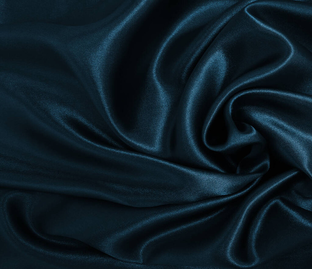 Smooth elegant blue silk or satin luxury cloth texture can use as abstract background. Luxurious Christmas background or New Year background design   - Photo, Image