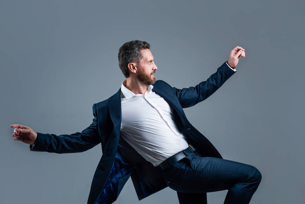 office manager man in jacket feel joy while dancing, success - Foto, Bild