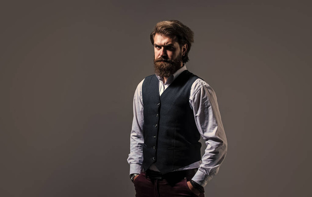 handsome and successful man in expensive suit. He is in shirt. stylish successful man in suit posing. business man wear suit. official office lifestyle. serious bearded man - Фото, изображение