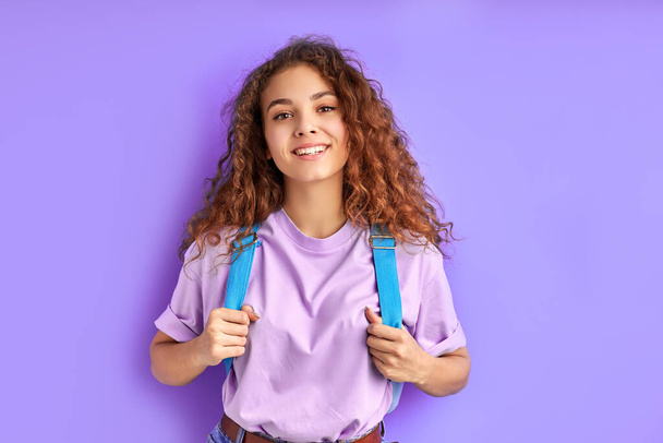 happy school girl with bag posing at camera isolated - Valokuva, kuva