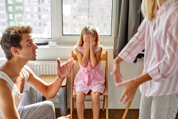 parents have quarrel in the presence of child girl - Foto, immagini