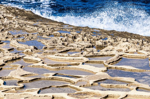 Salt pans near Qbajjar in Gozo, Malta. - Photo, Image