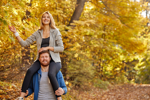 lovely caucasian couple enjoy the walk in the forest - Foto, immagini